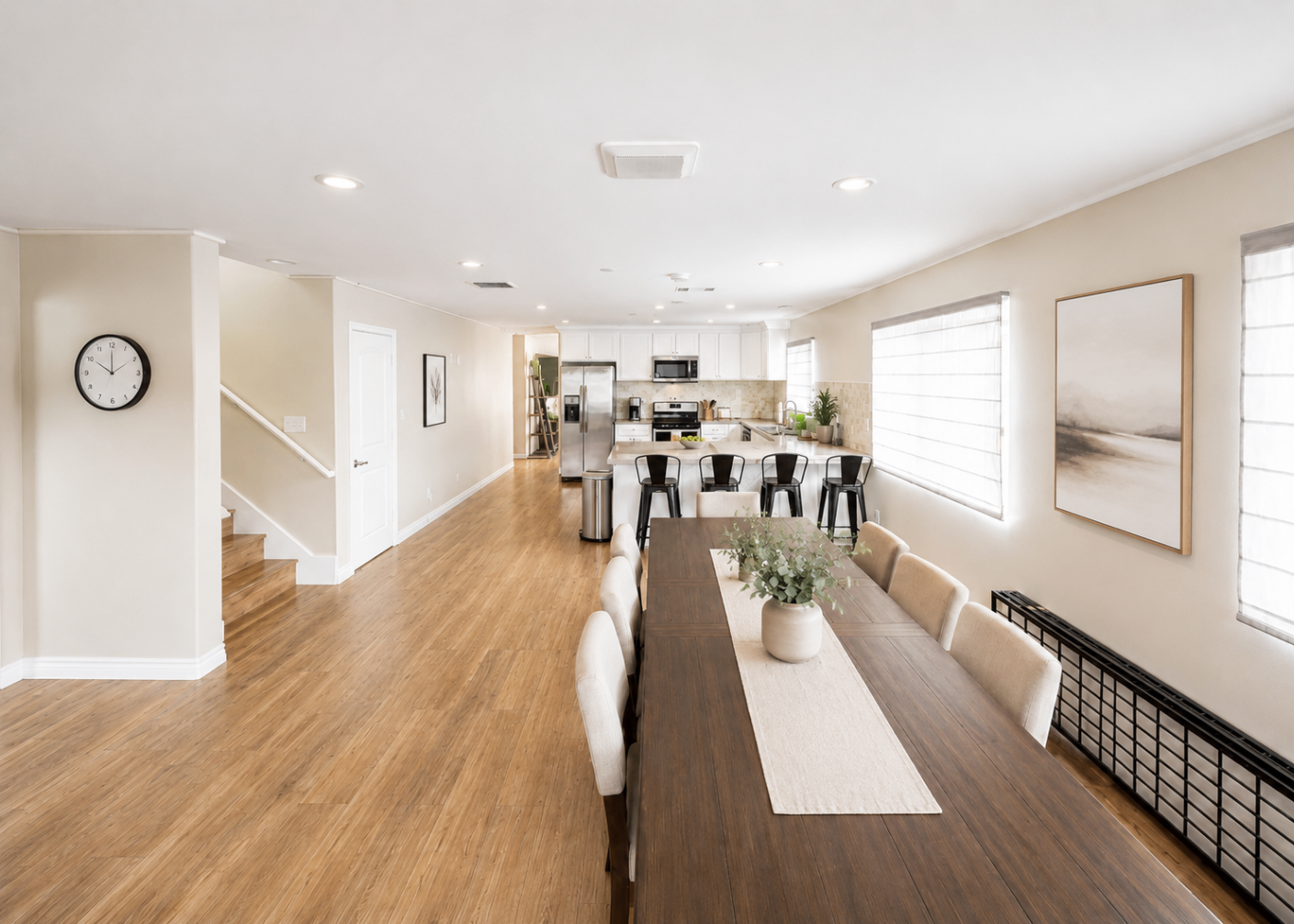 The open kitchen and dining area at Hangar Two with a long communal table