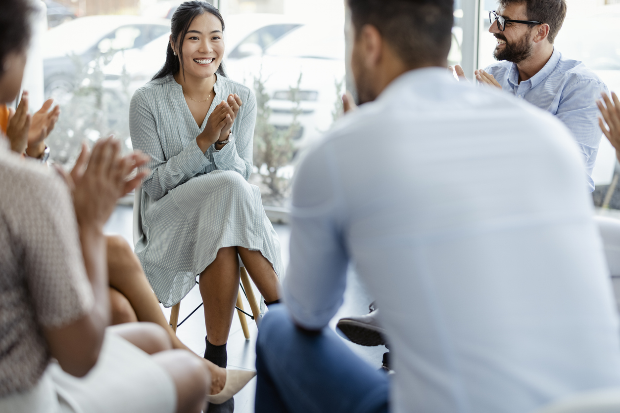 A small group therapy session in a comfortable, private room at The Runway